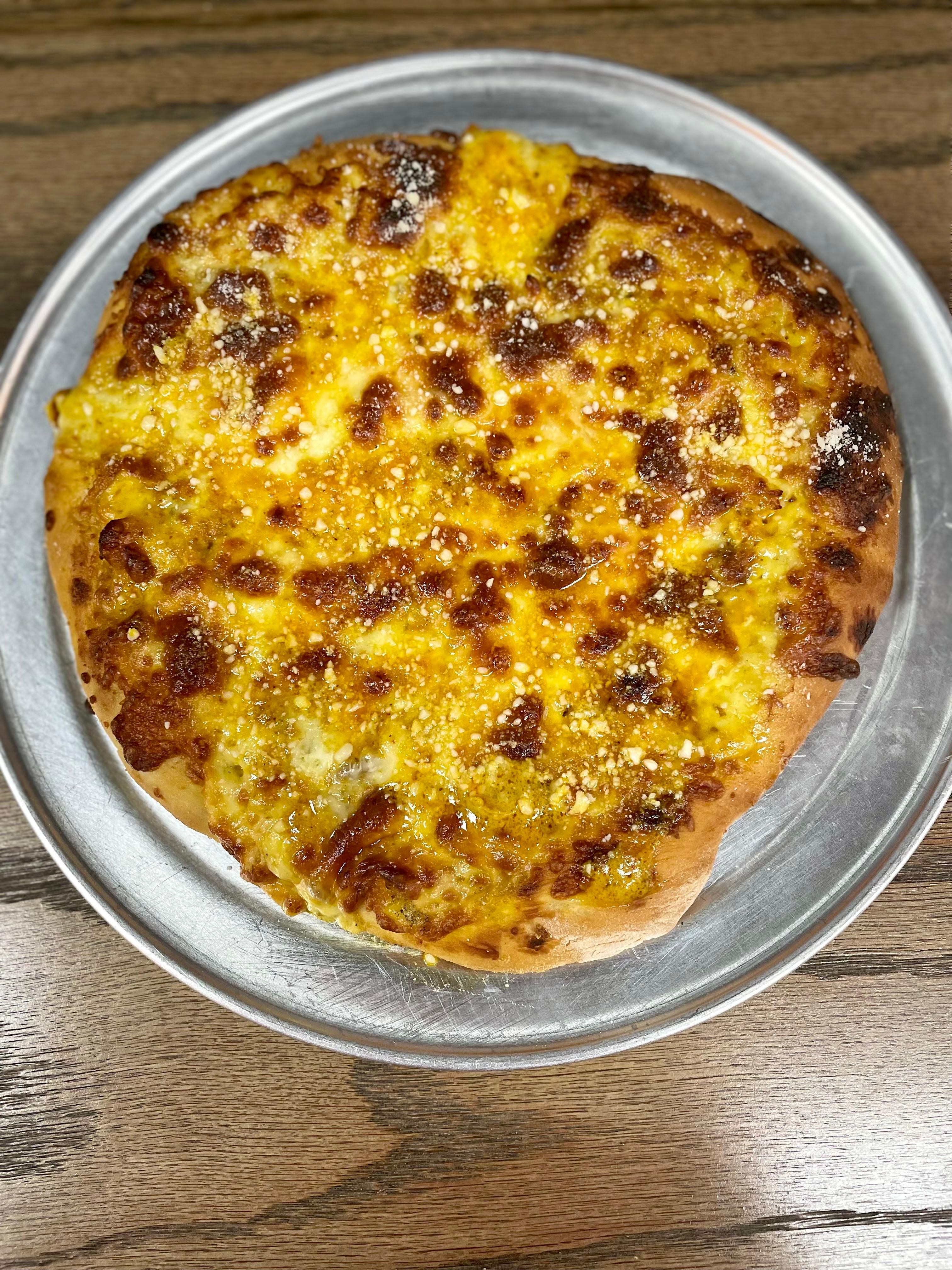 Yellow curry chicken pizza
