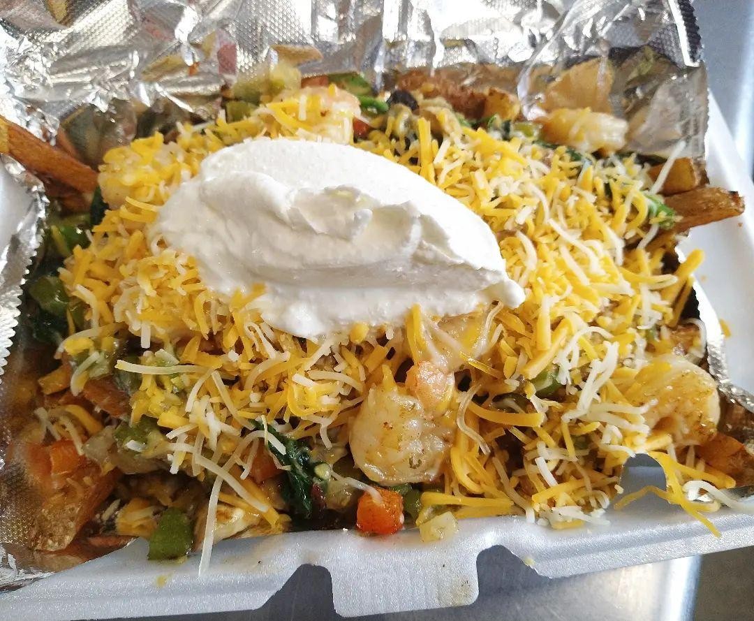 Loaded veggie fries or tots w/cheese