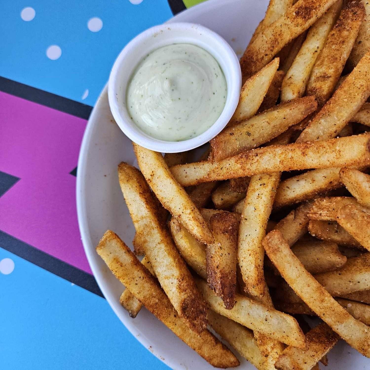 Old Bay Fries - Tossed in Old Bay, served with Pesto Aioli