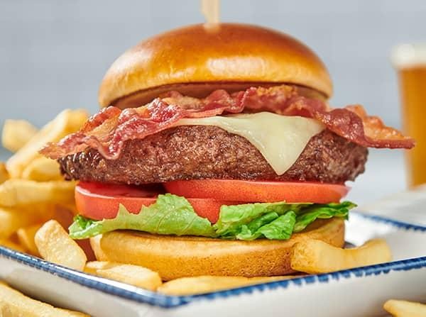 Shrimp Burgers with Chipotle Cream and Coconut Peach Salsa