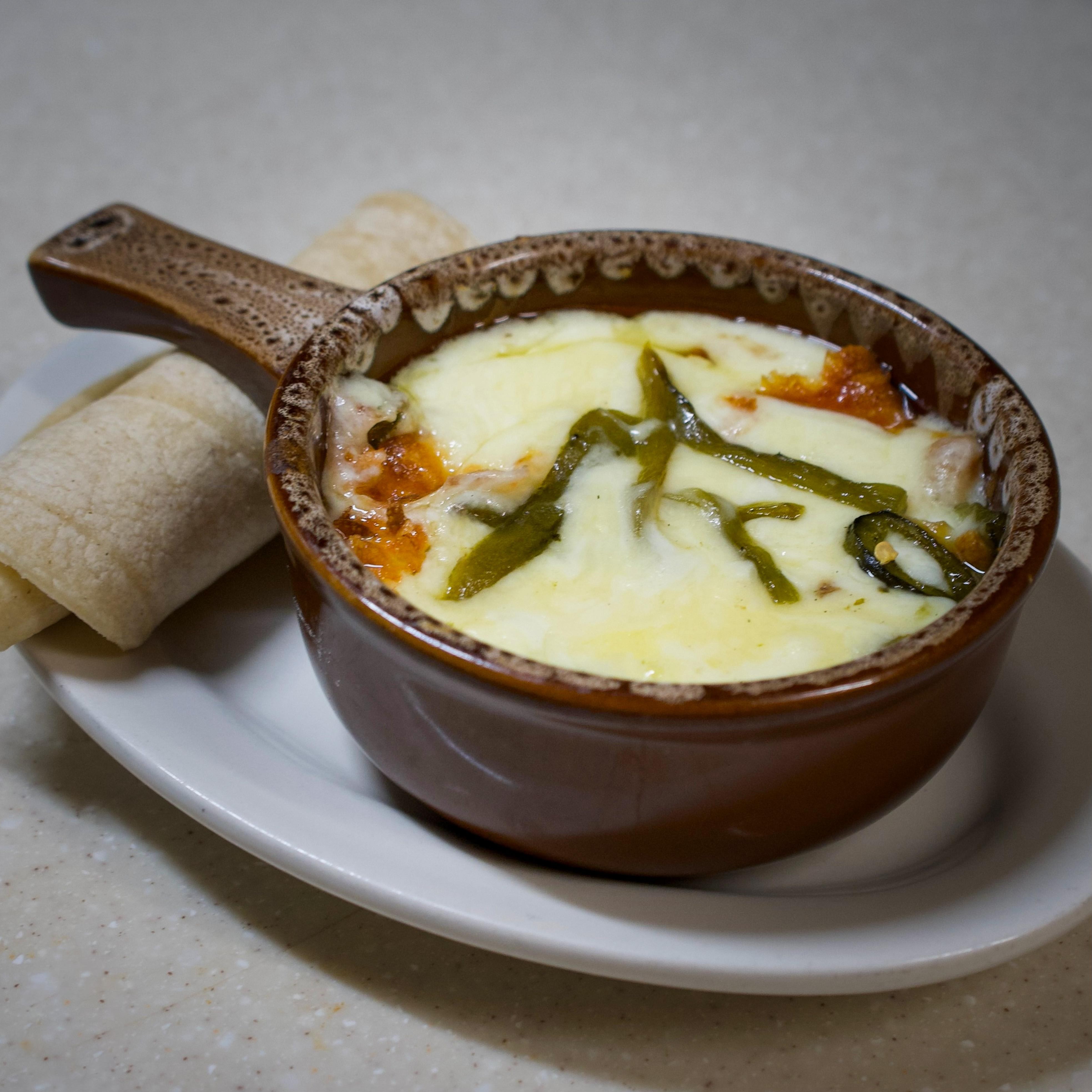 Baked cheese with poblano pepper