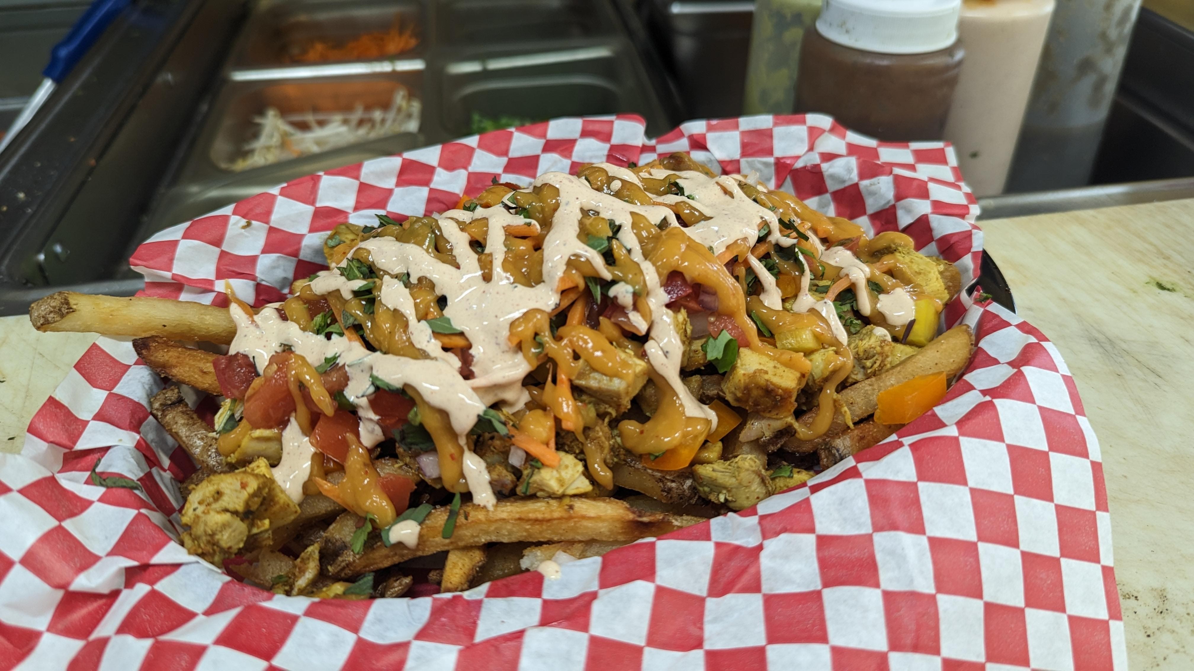 Curry Chicken Loaded Fries
