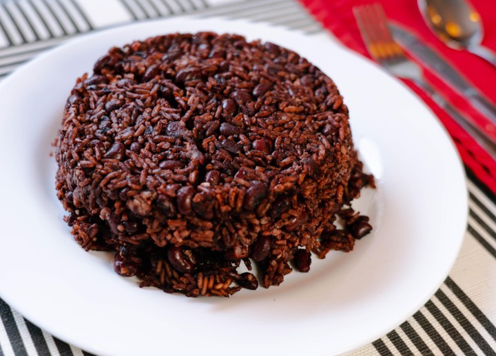 Waakye Served with Sautéed Fried Fish & Shito Sauce