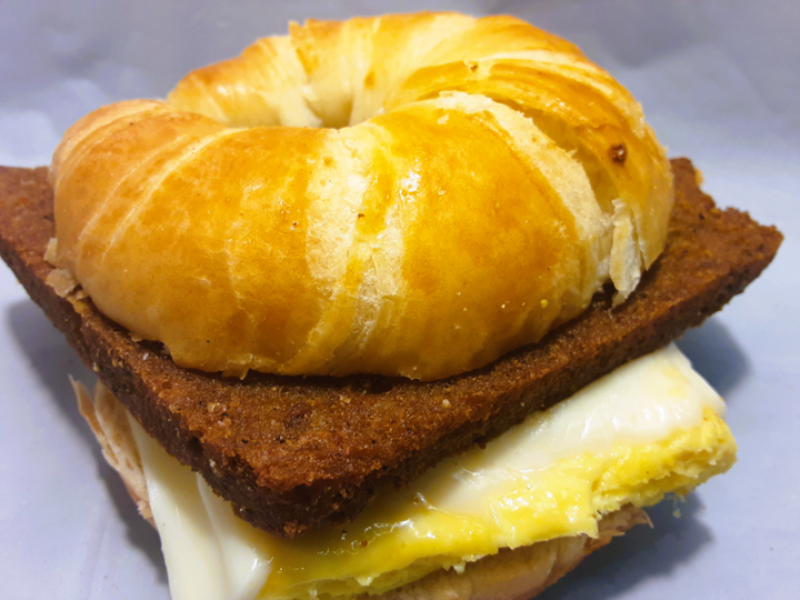 SCRAPPLE EGG AND CHEESE ON CROISSANT