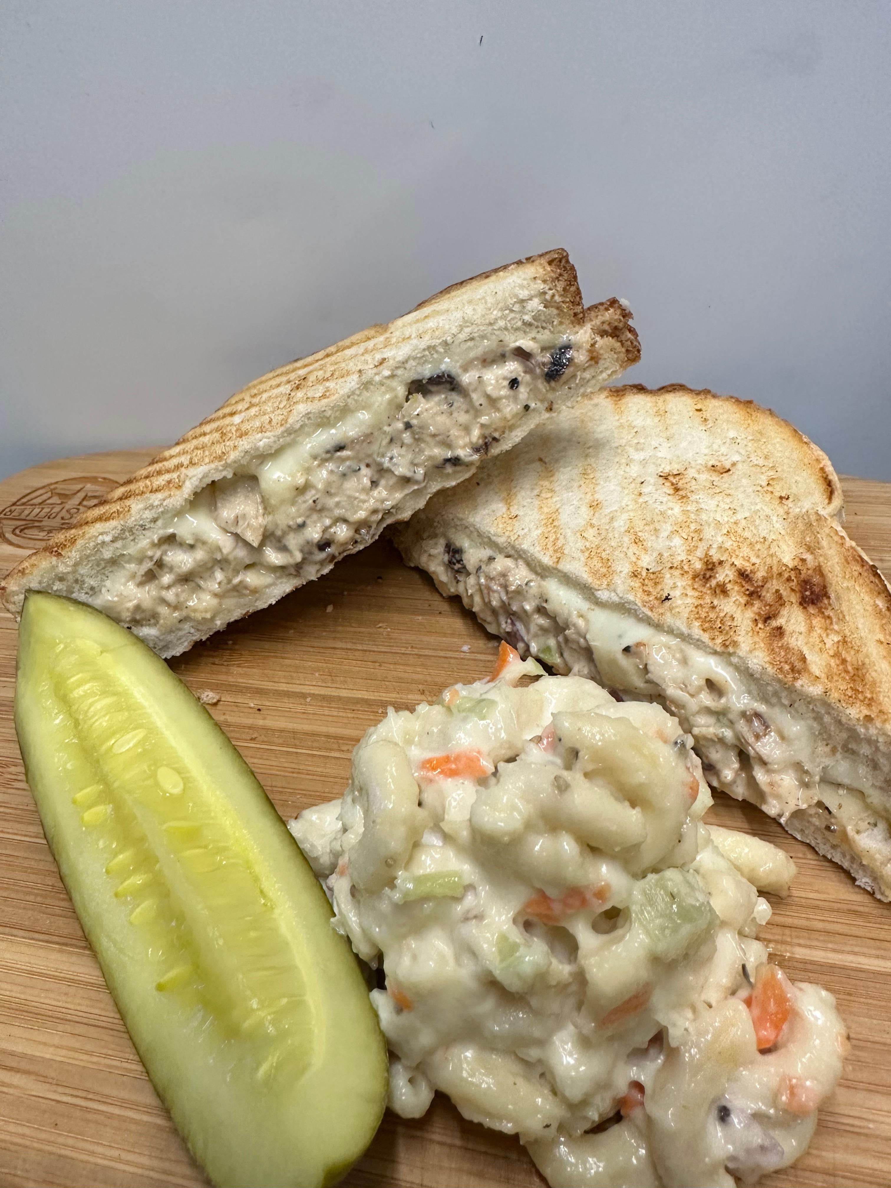 PANINI - CHICKEN SALAD MELT (chicken salad made with almonds, cranberries & onions with cheddar on italian)