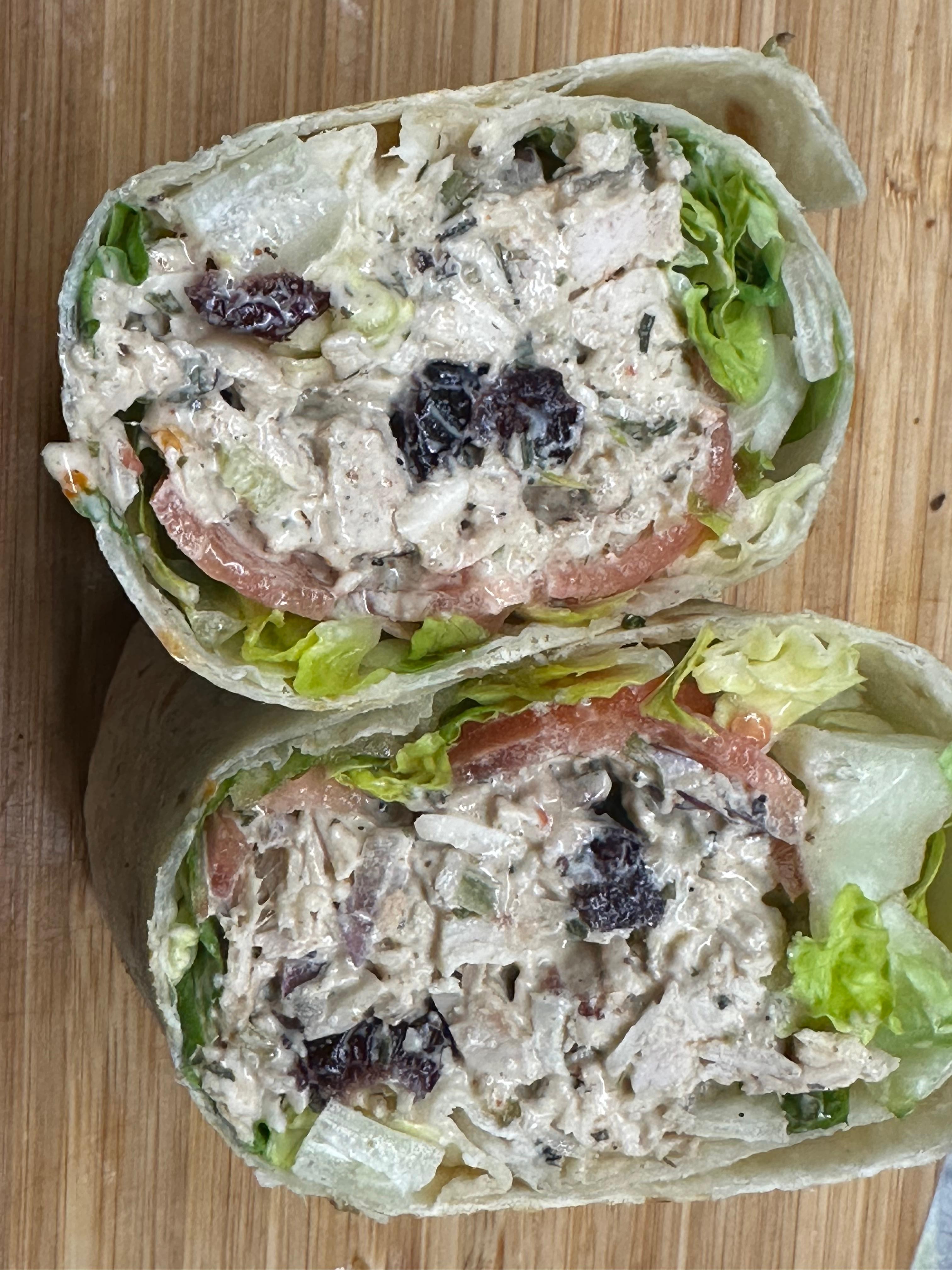 CHICKEN SALAD WRAP (chicken salad made with cranberries, almonds, mayo and onions with lettuce and tomato)