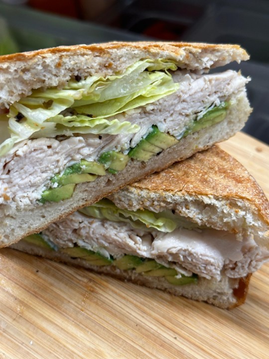 PANINI - TURKEY & AVOCADO (turkey, avocado, balsamic & romaine on ciabatta)