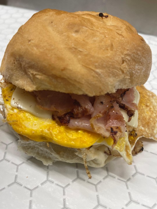 HAM EGG & CHEESE (2 eggs, ham & american on hard roll)