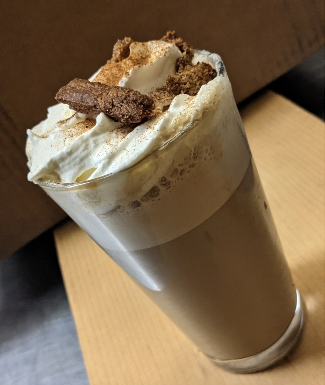 "Snickerdoodle Latte" Creamy Cinnamon and brown sugar topped with whipped cream and caramel