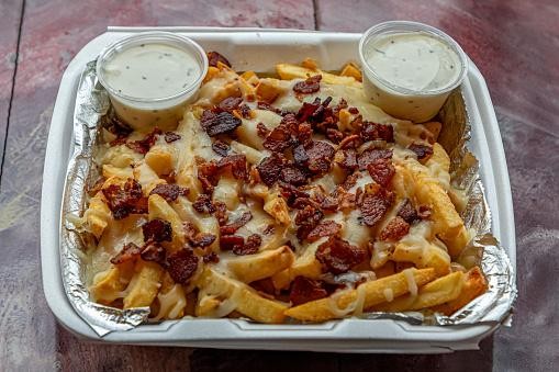 ADD CHEESE AND BACON TO YOUR FRIES