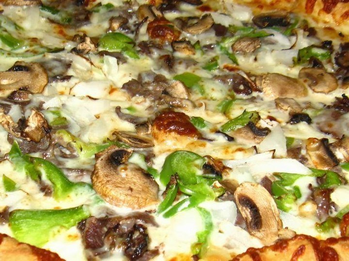 PHILADELPHIA garlic butter, sliced ribeye, grilled mushroom, onion, green pepper, mozzarella, garlic romano, parmesan, oregano