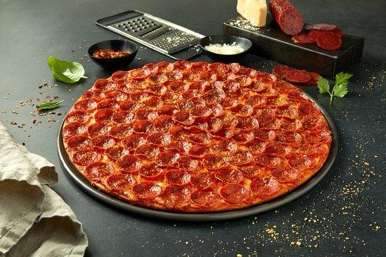 NEW YORK CITY thin crust, pizza sauce, overlapping pepperoni, parmesan & oregano