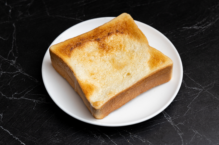 Toast w/ Condensed Milk & Butter or Condensed Milk & Peanut Butter 奶油/奶醬薄多士