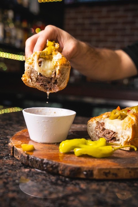 Italian beef w/ cheese sandwich