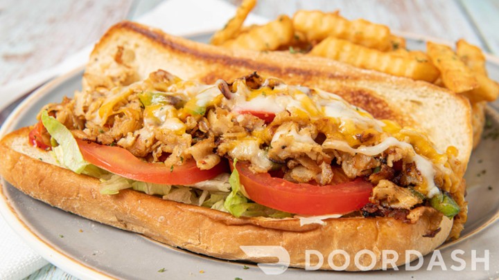 Chicken Cheesesteak with fries and a drink