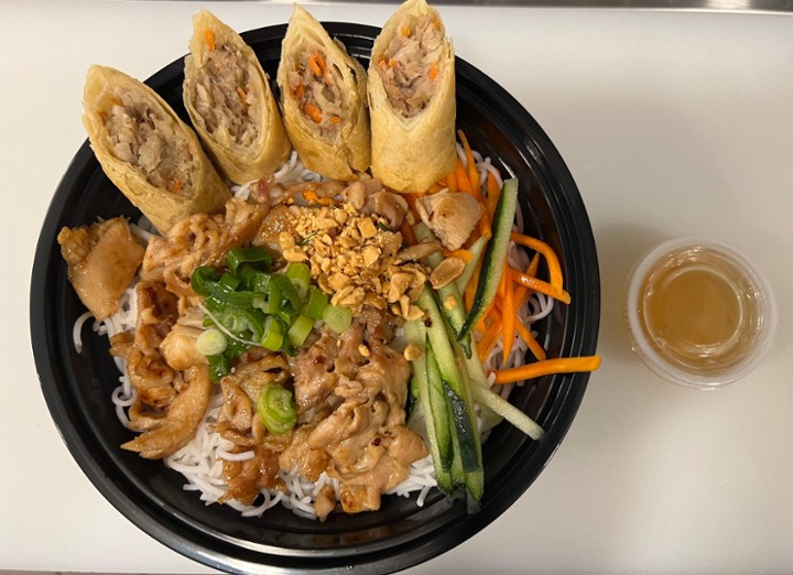 vermicelli with grill chicken and egg rolls.