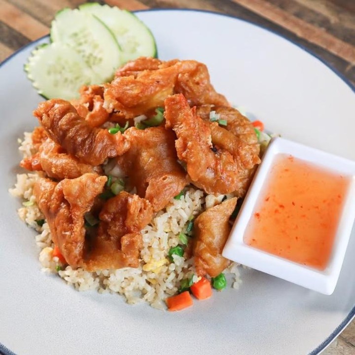 Fried chicken over fried rice