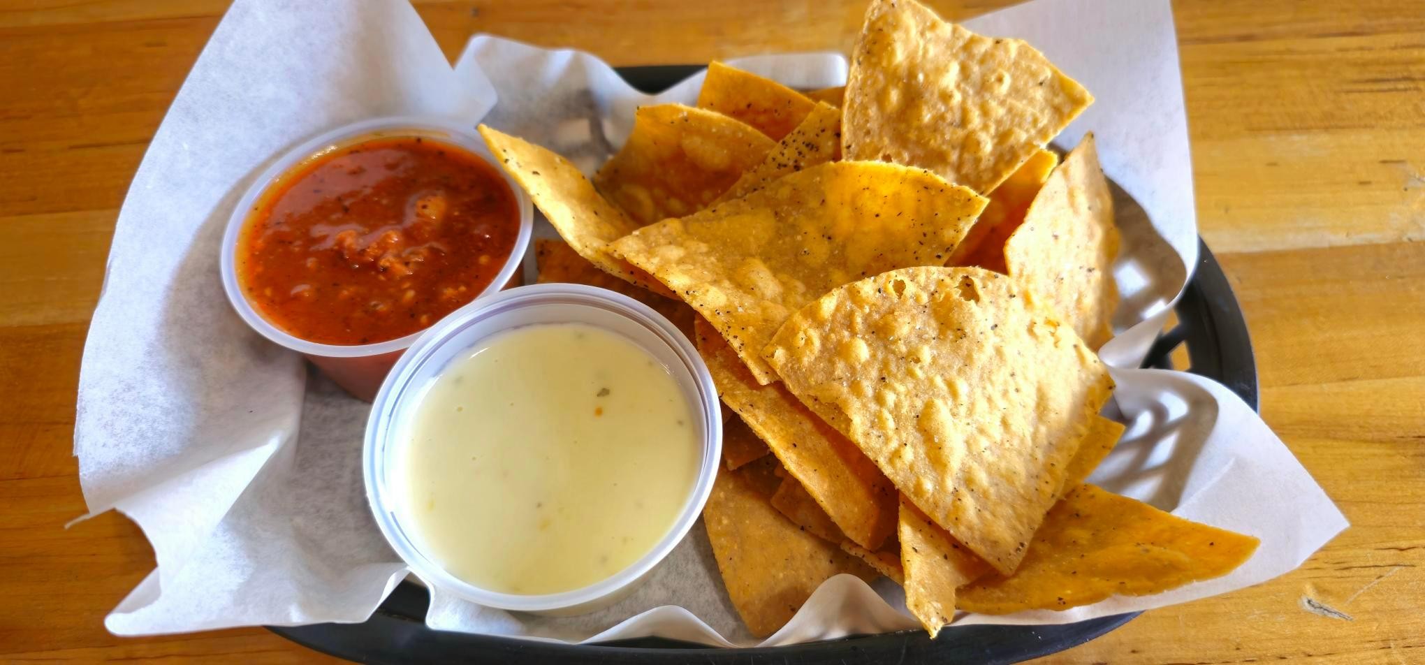 House-Made Chips with Salsa or Queso