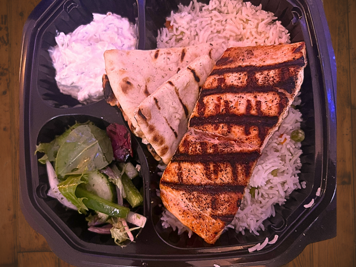 Grilled salmon over rice