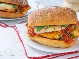 CHICKEN PARMESAN SANDWICH --with fresh mozzarella, tomato basil garlic sauce, Kaiser roll