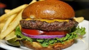 AMERICAN BURGER-ANGUS BEEF,ONIONS,  AMERICAN CHEESE,LETTUCE, TOMATOES, & PICKLES