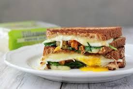 GRILLED EGG SANDWICH, ROASTED TOMATOES, PEPPER JACK CHEESE, SPINACH