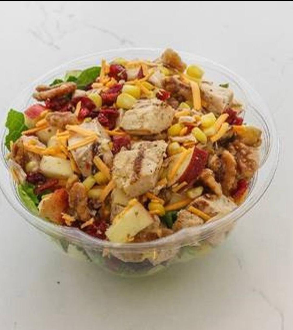 Autumn Harvest Salad-Grilled Chicken, Apples, Spinach, cherry tomatoes, fried onions, dried cranberry, cheddar cheese, Pecan, chickpeas , & light balsamic dressing .