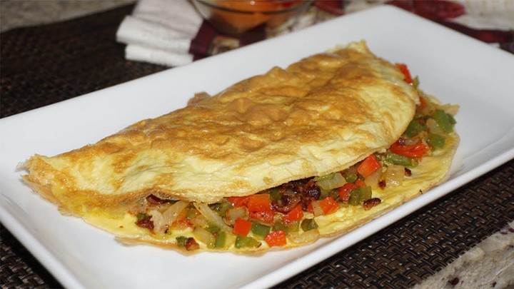 PORK SAUSAGE/EGG OMELETTE with Cheddar cheese, onions and peppers, pork sausage, tomatoes