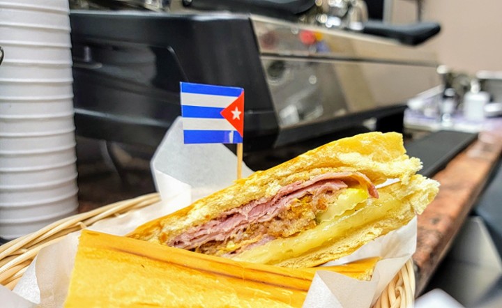 Cuban sandwich (ham, pork, cheese, cuban bread ,pickles, mustard)