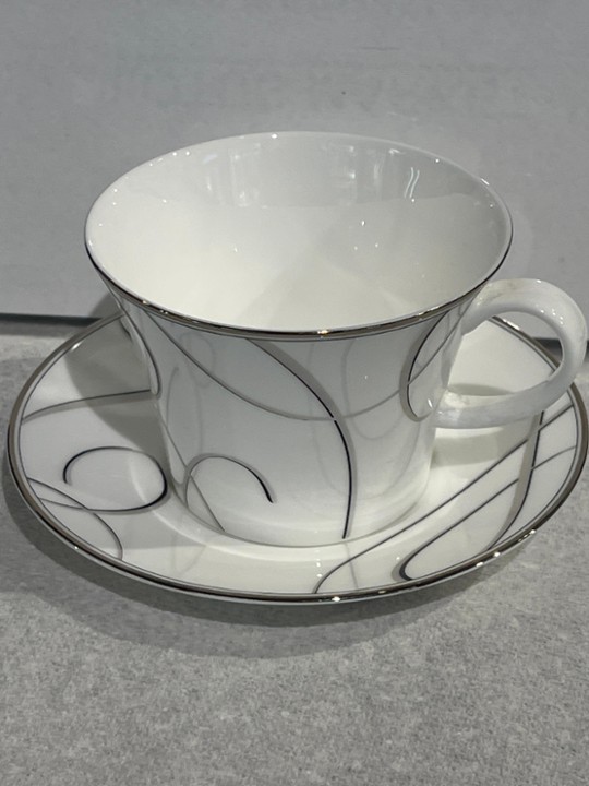 Elegant swirl fine bone chime nikko made in Japan tea cup and plate
