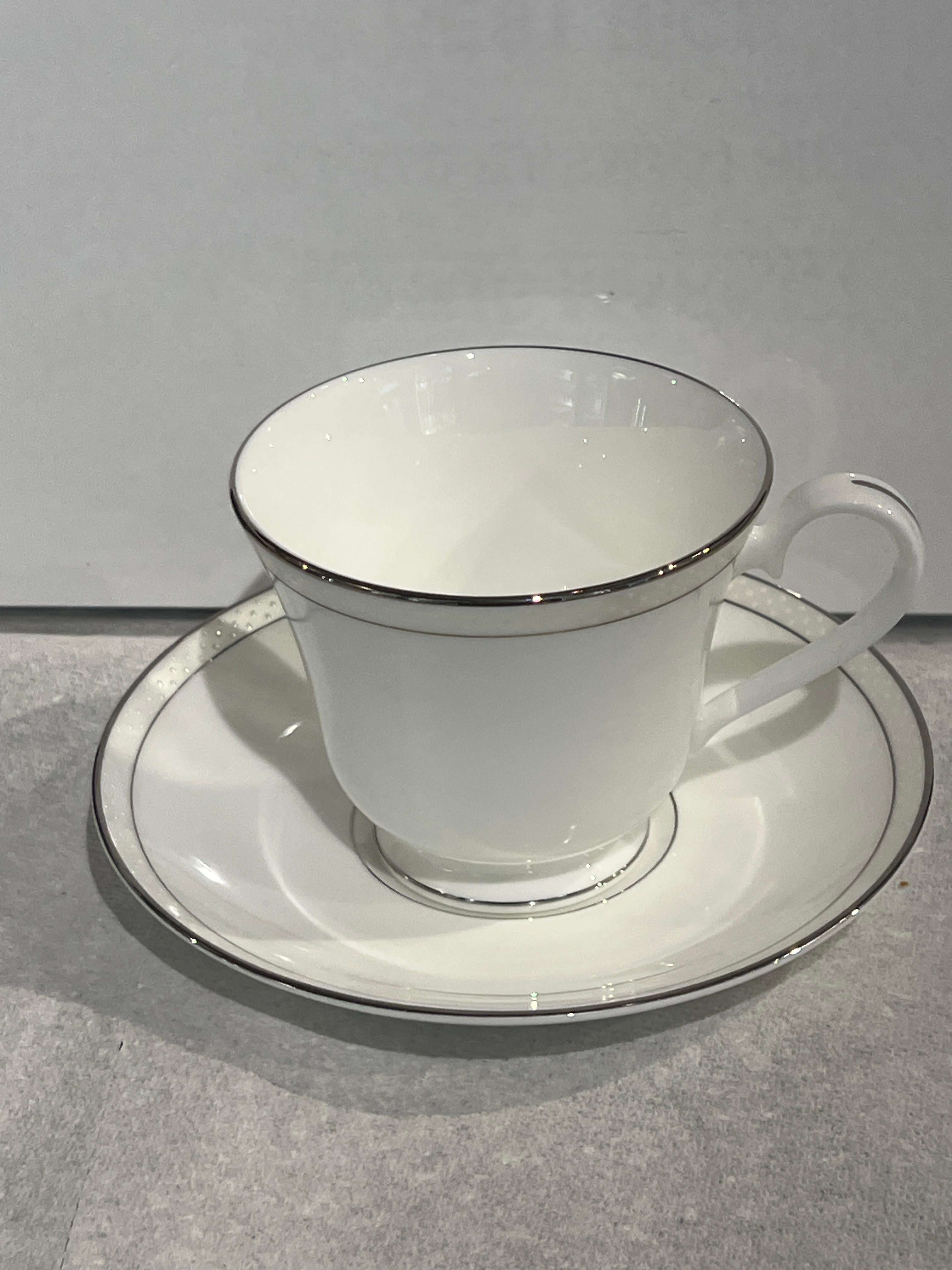 Platinum beaded pearl fine bone china . Nikko made in Japan. Tea cup with plate