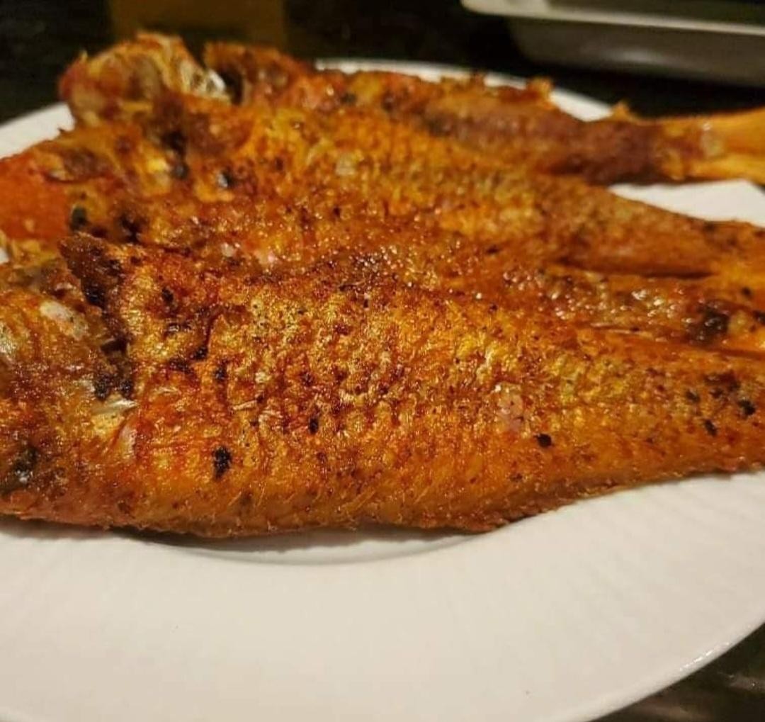Fried Whole Snapper paired with cabbage medley