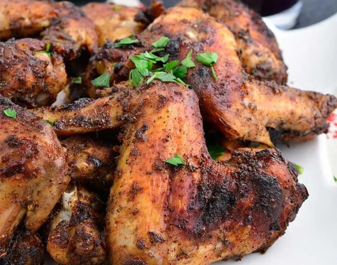 Jerk Wings with rice & pea