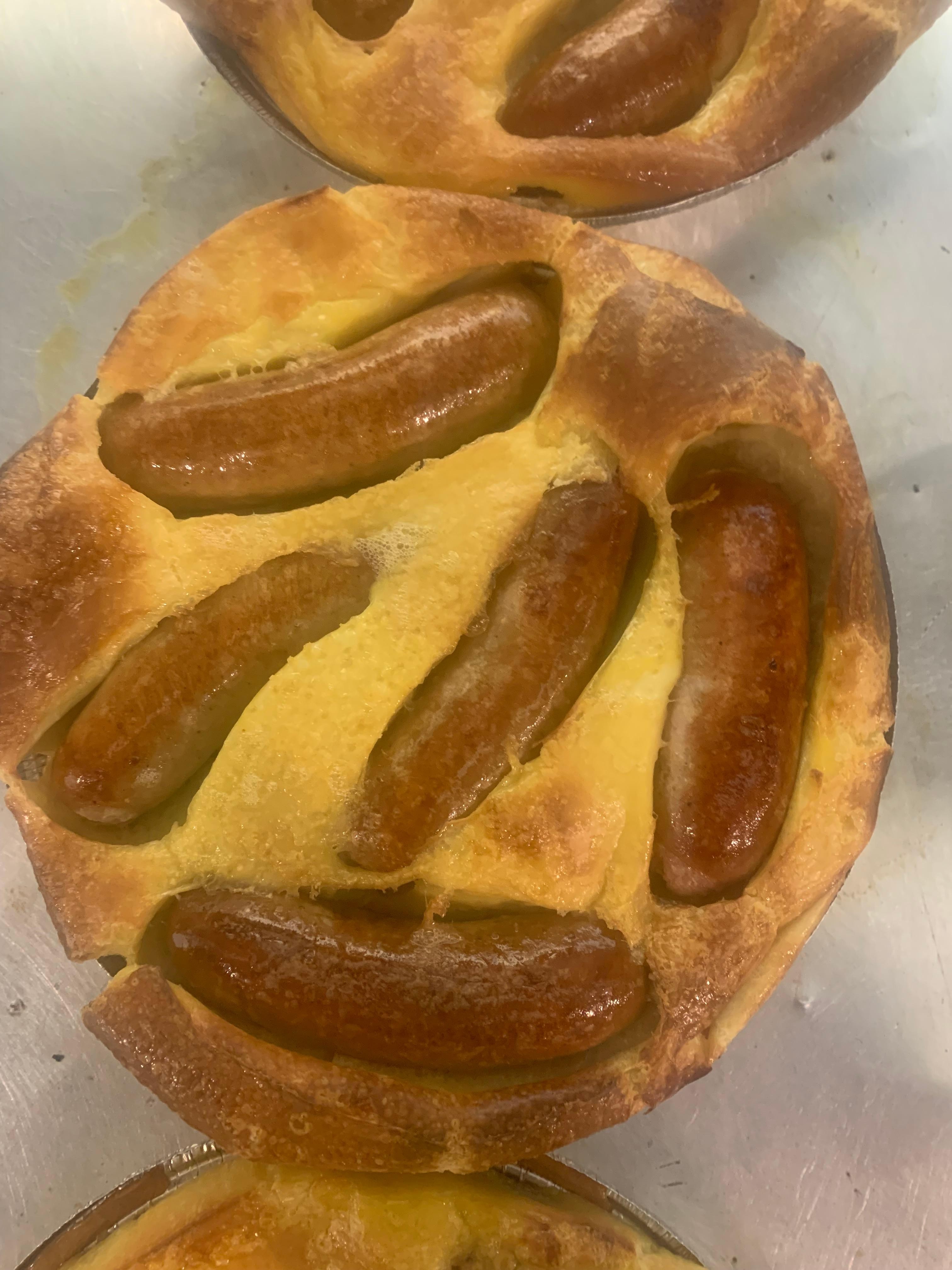 Whole toad in the hole with onion gravy