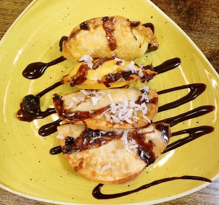 Deep-Fried Dumplings with Cheesecake and Pineapple Bits