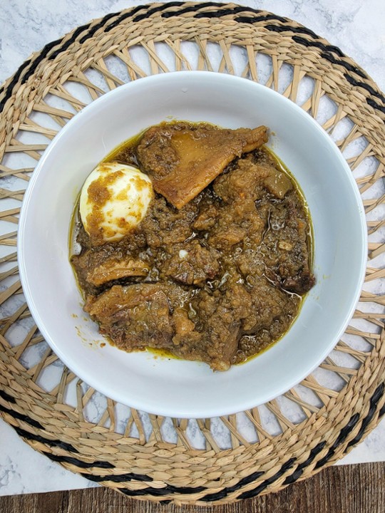 AYAMASE (DESIGNER STEW)  (Tasty & spicy blend of green pepper & locust bean)  With ofada rice