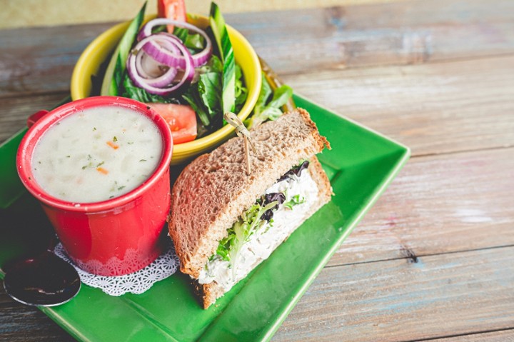 Half of A Sandwich with Soup and Salad