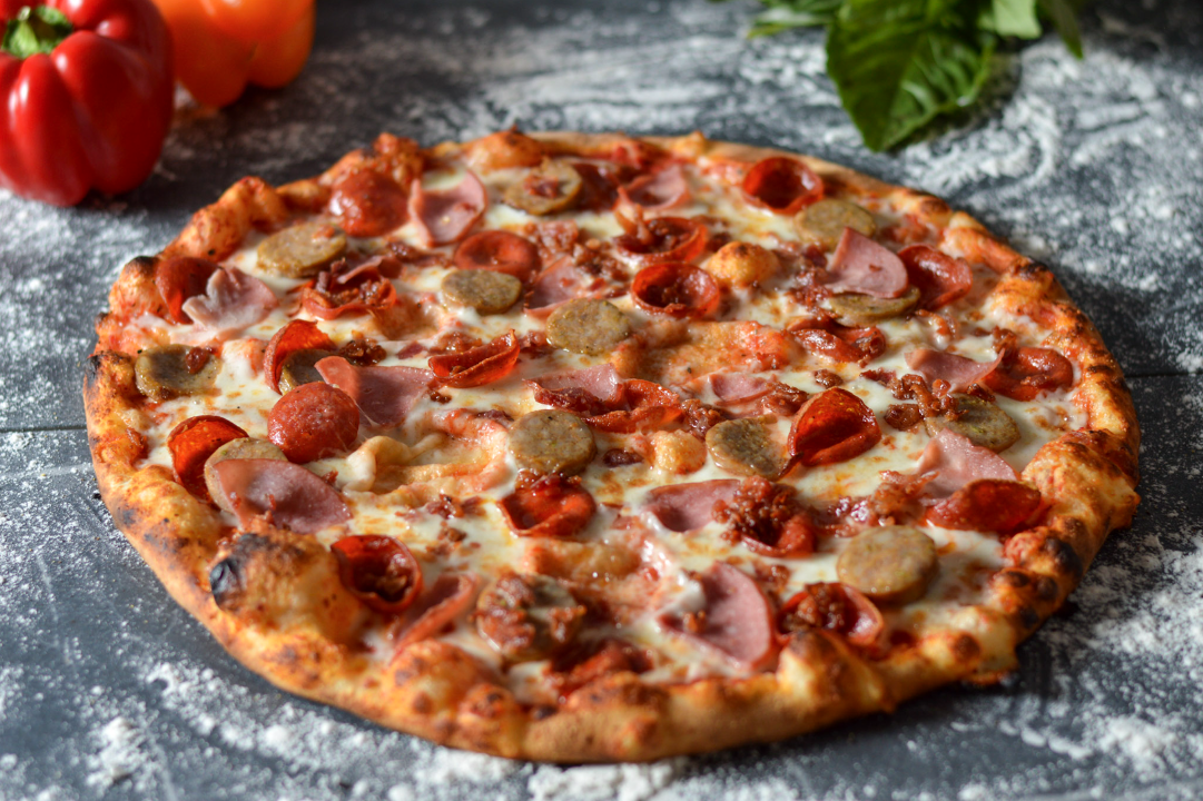 Meat Lovers Pizza -  Pepperoni, Bacon, Italian Sausage, Ham