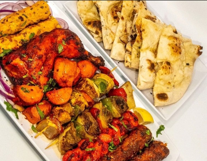 # 4 Mixed Kebab Platter - 2 leg quarter, 1 lamb boti kebab, 1 Beef & 1 Chicken Boti Kebabs, 8 pc. tikka, 8 pc. shrimp, 2 Tandoori Naan, Large Rice, Salad & Sauces
