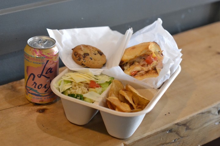 BOX MEAL - Choice of Main item served individually boxed with a side salad, house cut potato chips, chocolate chip cookie, and beverage