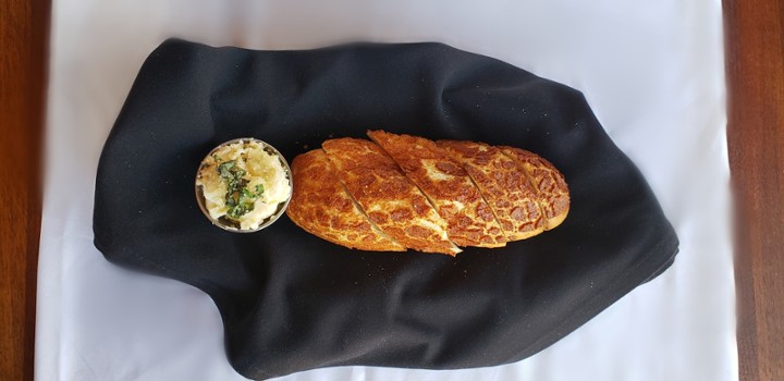 Breadbasket with Salted Basil Butter