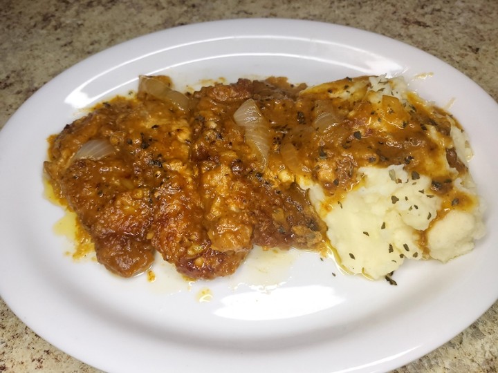 Smothered Pork Chops and gravy w/ Rice