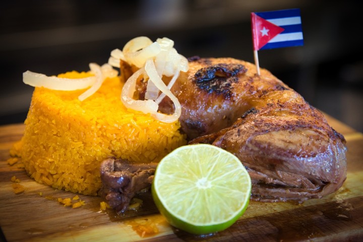 Cuban Style Roasted Chicken Served with one side and a soda