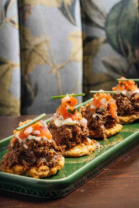 Tostones Topped with Vaca Frita