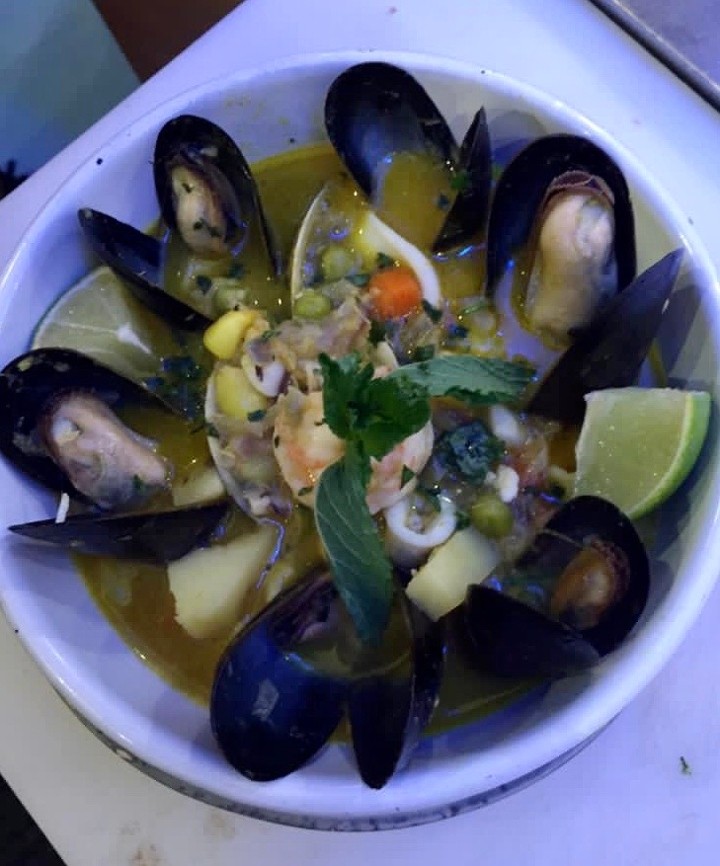 cau cau de mariscos / seafood stew with mint, tumeric and aji amarillo