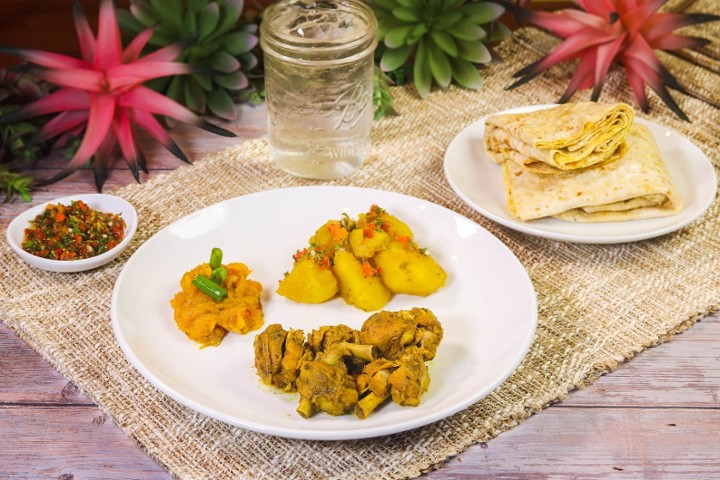 Joy's Roti Joy's Roti Delight - Dhalpourie with Curry Chicken