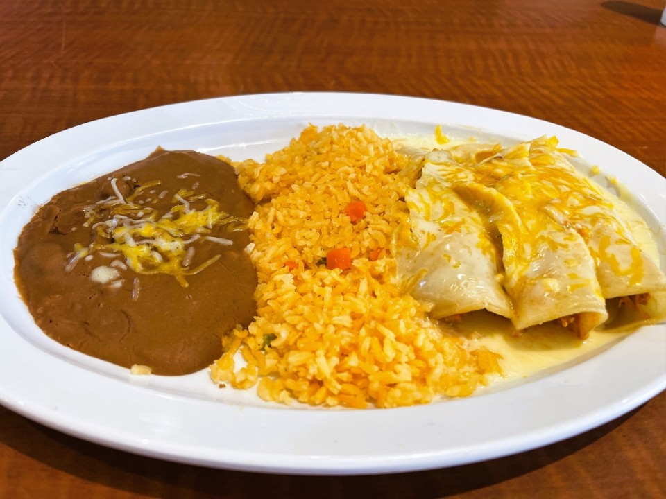 Enchiladas (3) Rice and Beans & $1 Drink*