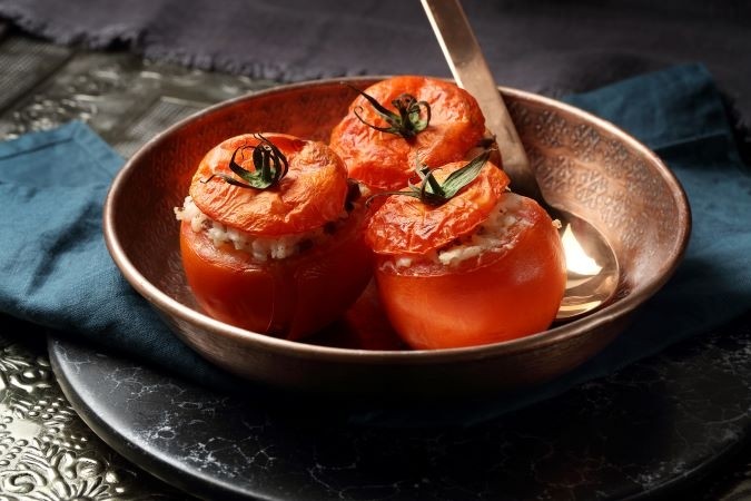 Tomatoes with cheese and herbs