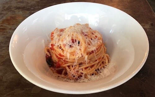 kid spaghetti + tomato sauce + parmesan