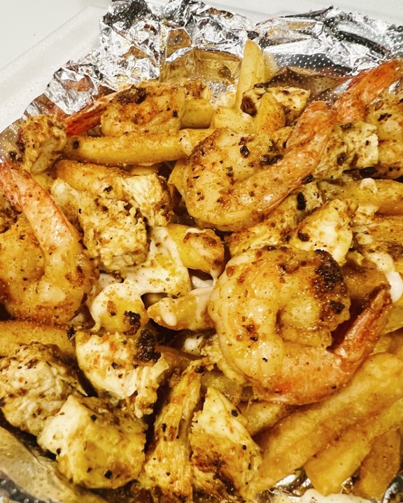 Cajun Jumbo Shrimp And Grilled Chicken Over Fries